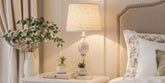 Stylish bedside lamp in a tranquil bedroom setting.